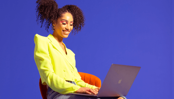 woman-curly-hair-using-laptop